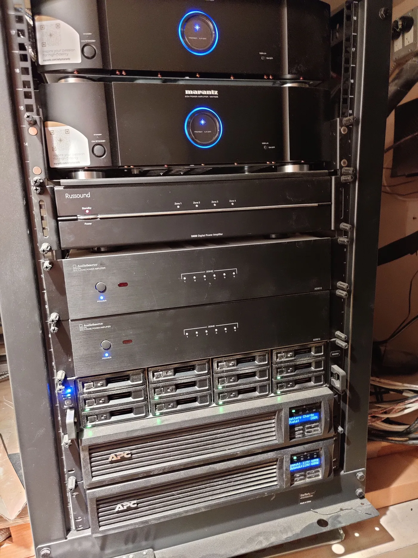 High-end NY/NJ home AV rack with Marantz amplifiers, multi-zone audio, a NAS media array and APC battery backup